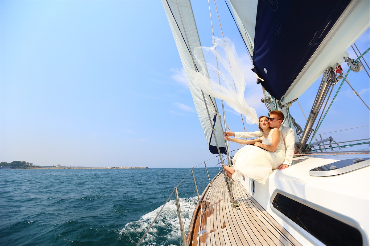 Couple having their wedding on a yacht