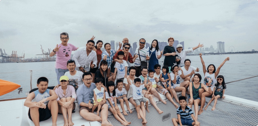 A group of people on a yacht in Singapore