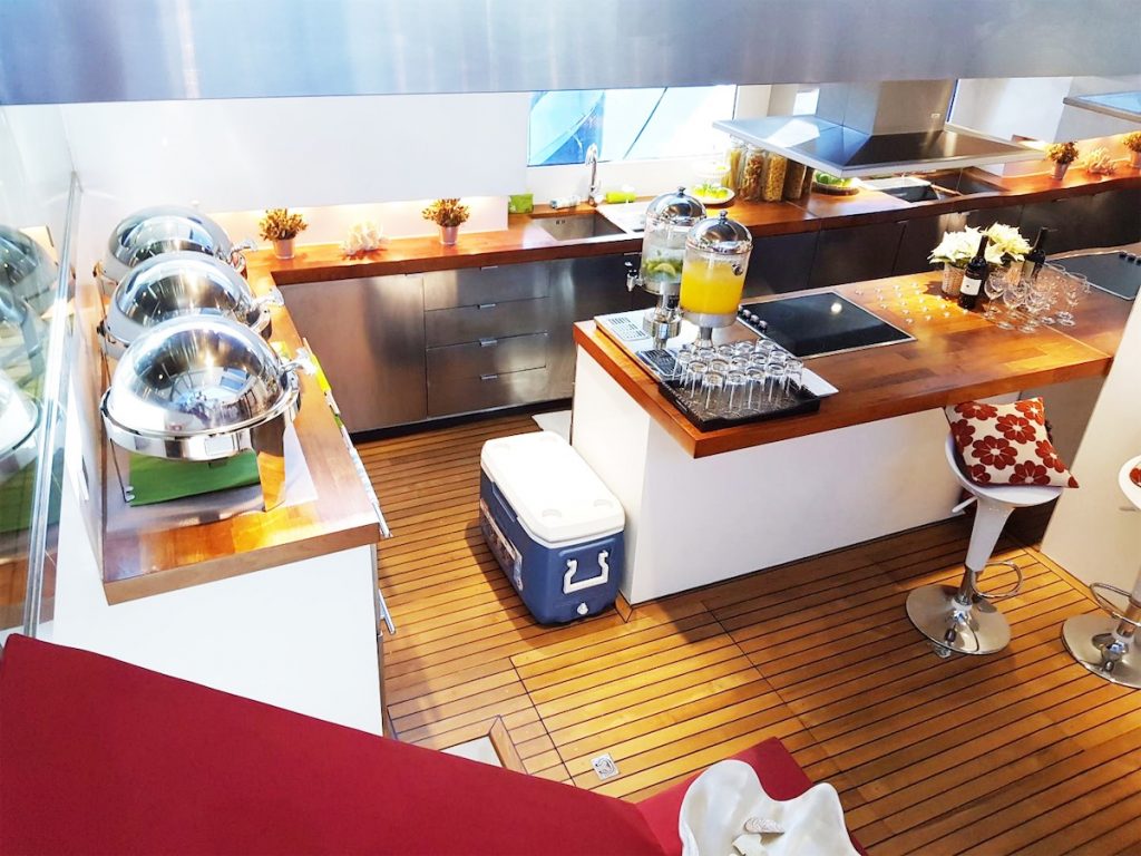 spacious kitchen with electric stove and wash counter in yacht ANKA